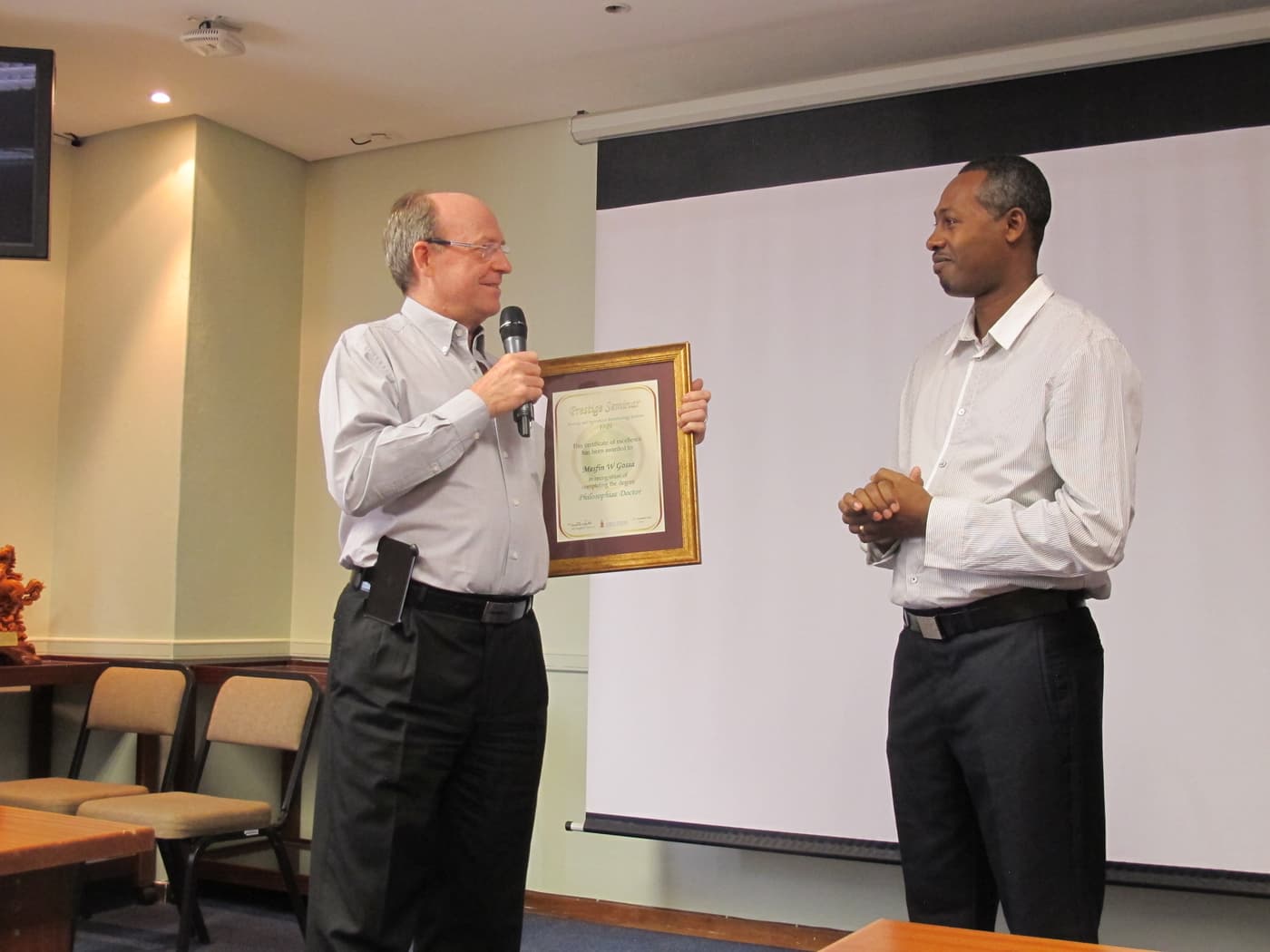 FABIans celebrate PhD degree with Mesfin Gossa and his family
